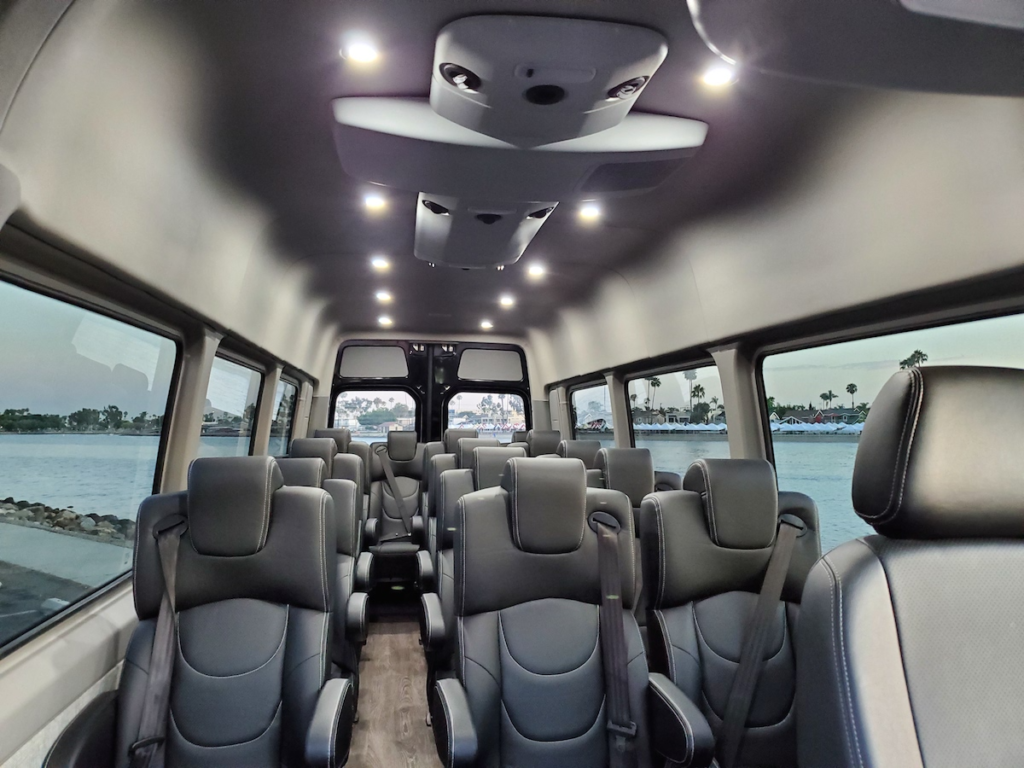 a charter van with black seats